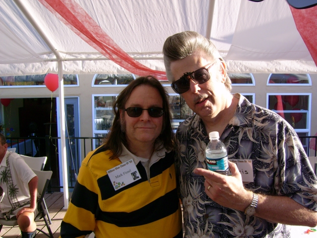 M. Fissel poses with recording artist Neil Slowhand Farris